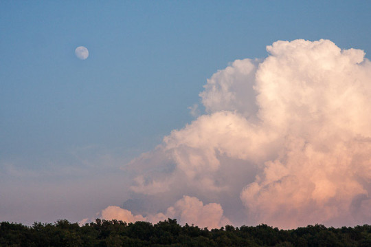 Daytime Moon over Storm Clouds